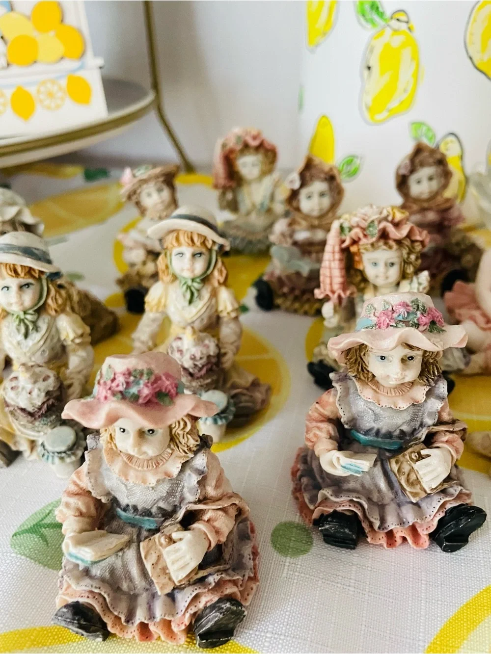 Collection of 14 Porcelain Figurines in Pastel Colors